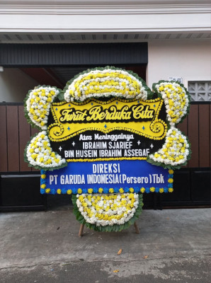Papan Bunga Duka di Batang Serangan