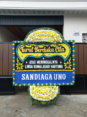 Papan Bunga Duka di Batang Serangan